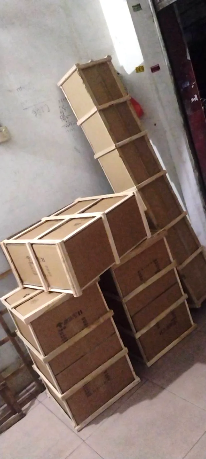 Chandeliers packed in wooden export crates ready for shipment
